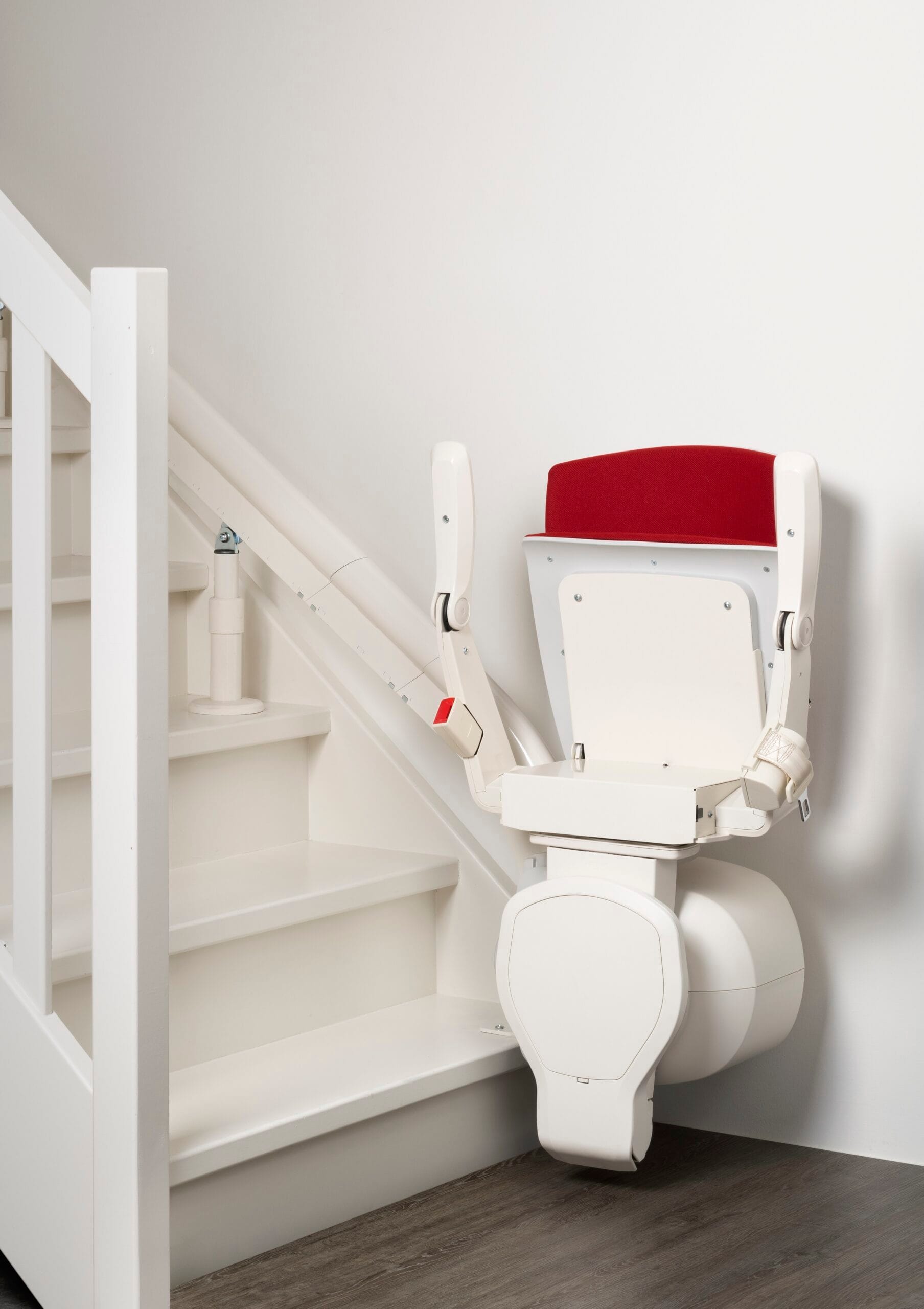 Stairlift chair installed on residential staircase